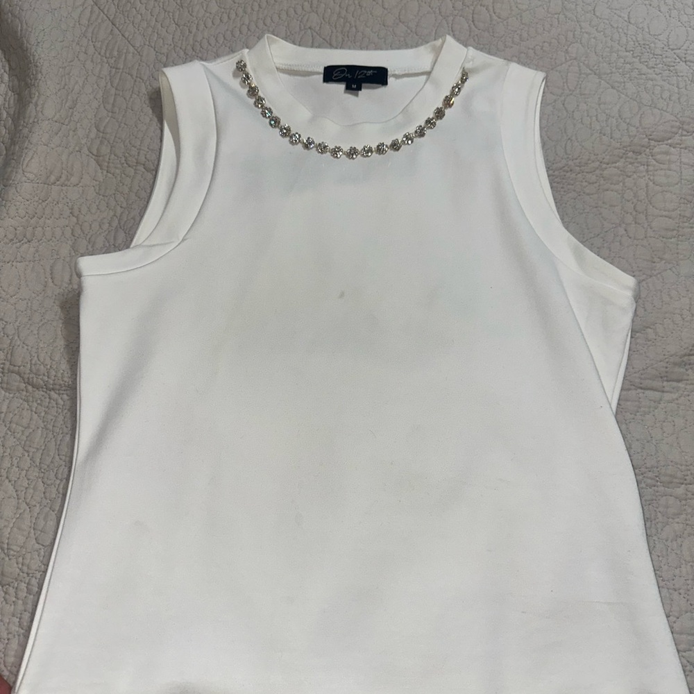 White Sleeveless Top with Embellished Neckline